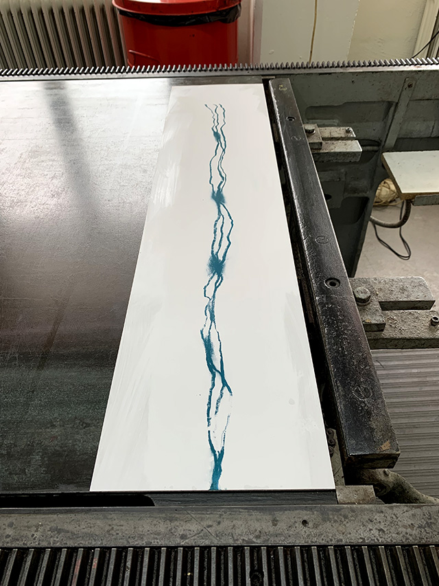 lithographic plate on the press bed