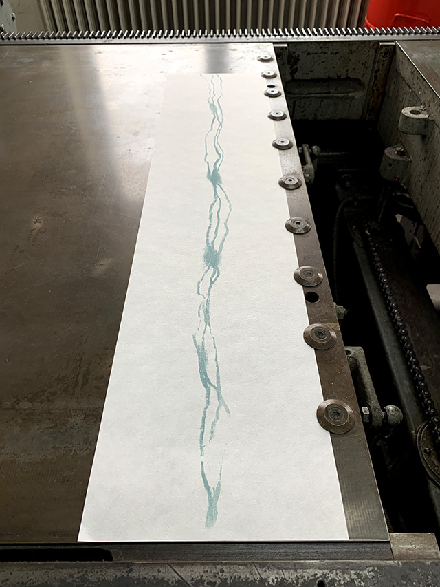 printed page on the press bed